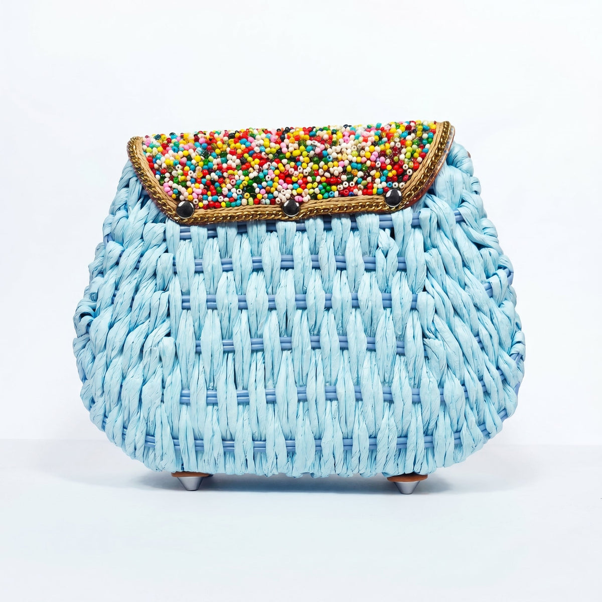 Bolsa transversal de ráfia trançada