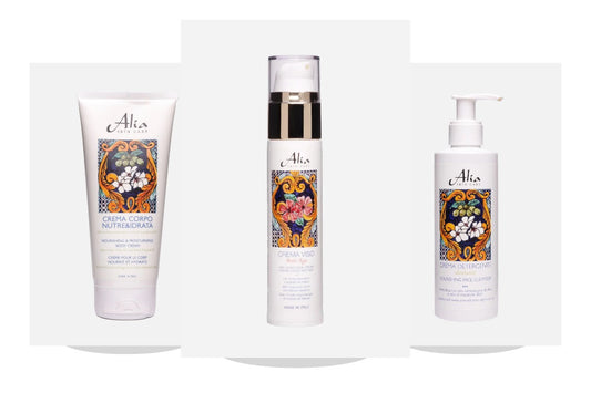 Creme viso e corpo Alia Skin Care di cosmesi naturale su sfondo bianco