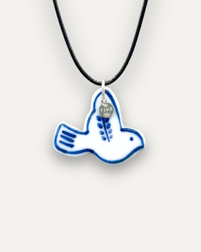 Porzellan-Charm Blaue Taube
