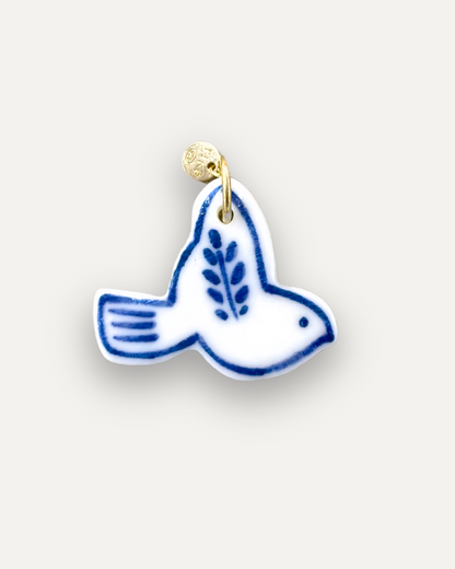 Porzellan-Charm Blaue Taube