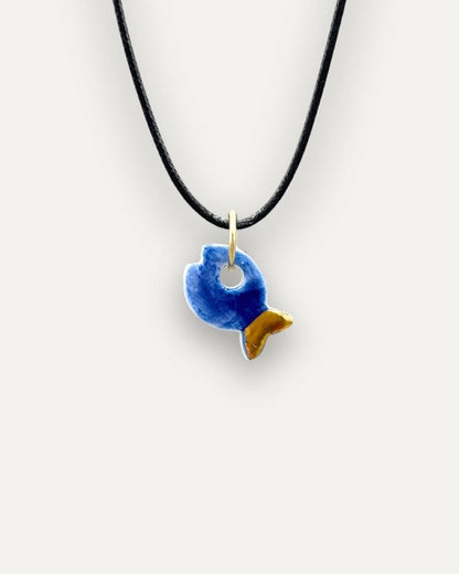 Charm in Porcellana Pesce Blu coda Oro