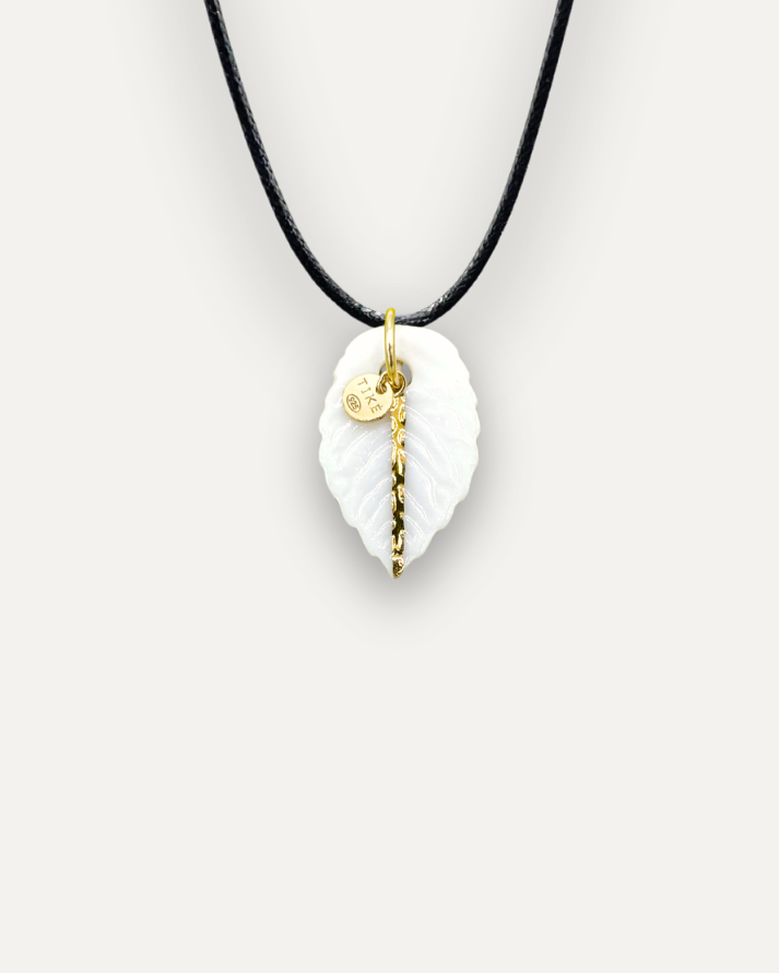 White leaf with gold stripe porcelain charm