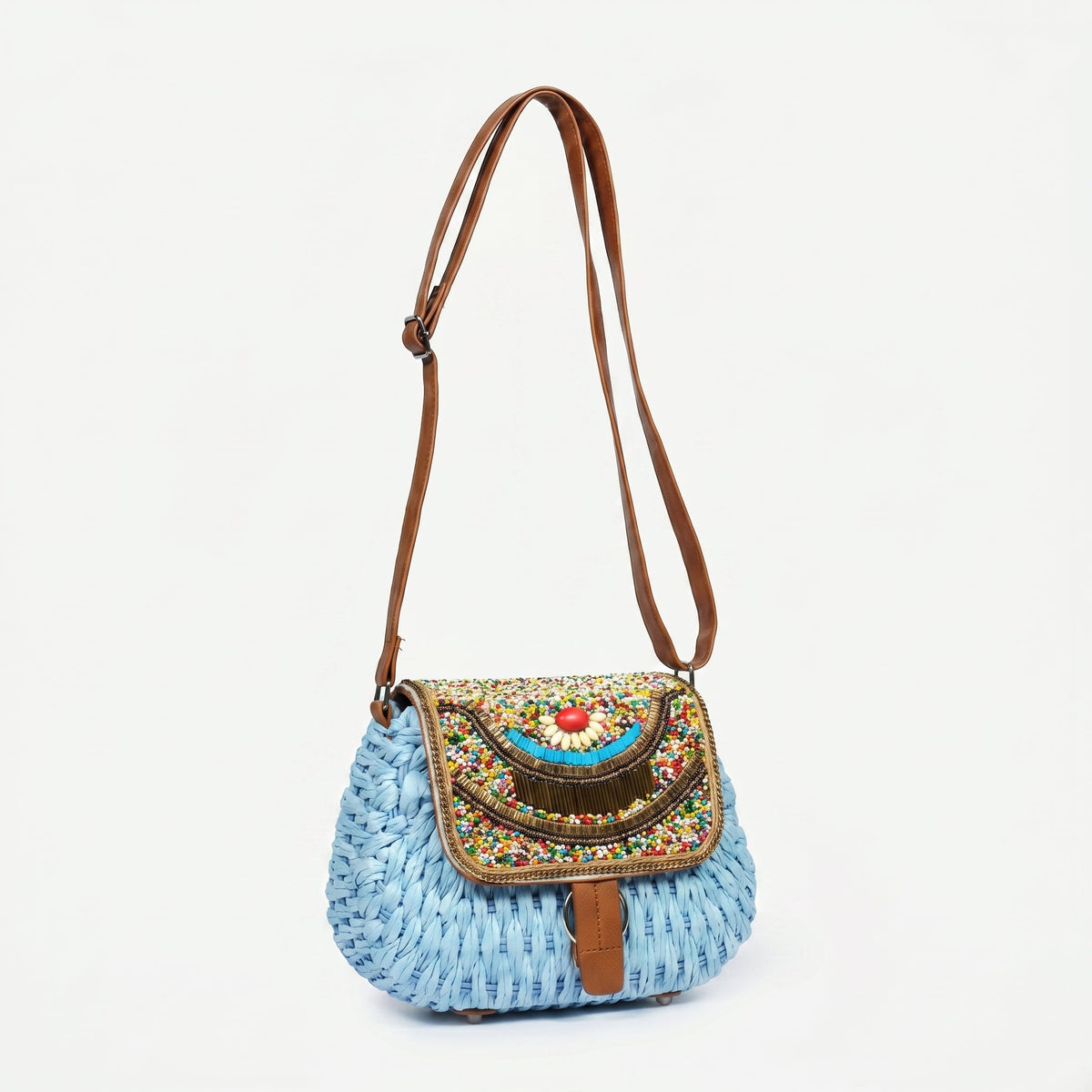 Bolsa transversal de ráfia trançada