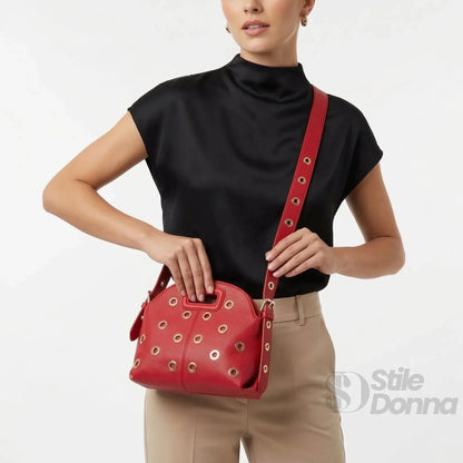 Bolso de hombro con ojales dorados