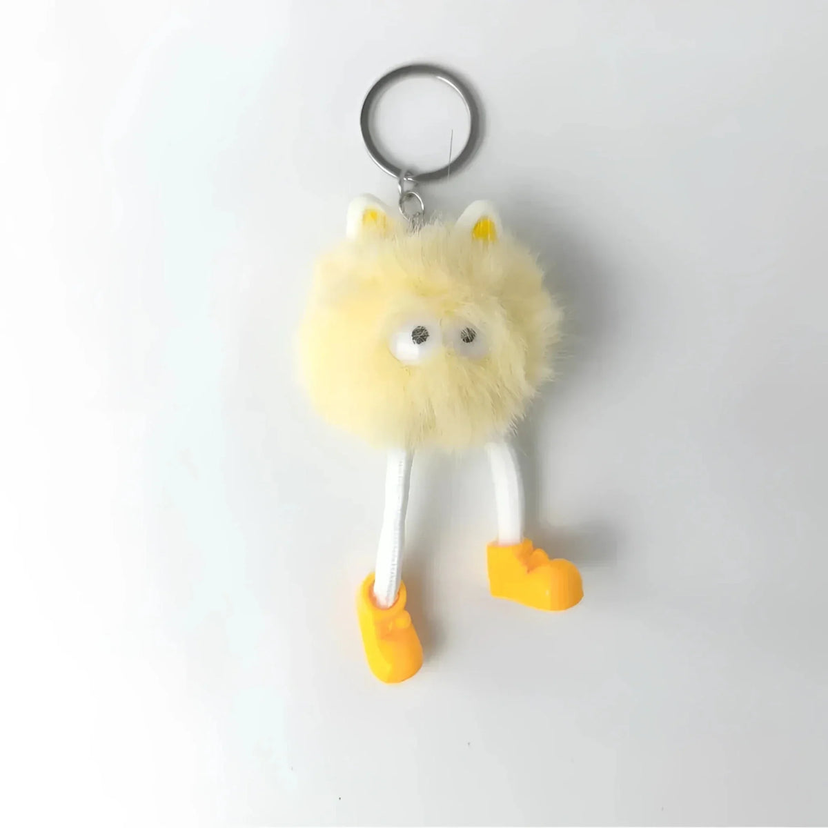 Ciondolo per borsa con pon pon