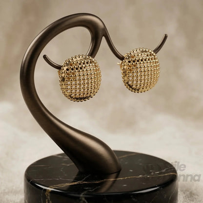 Boucles d’oreilles puces texturées