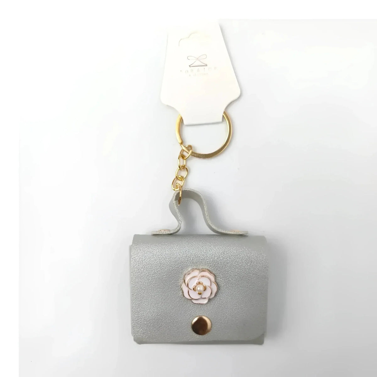 Floraler Schlüsselanhänger mit Portemonnaie